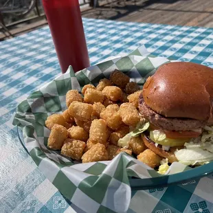 a burger and tater tots