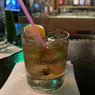 a drink in a glass with a straw