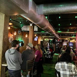 people sitting at a bar