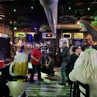 a group of people in a bar