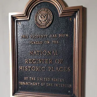 a plaque of the national register of historic places