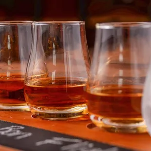 four glasses of wine on a table