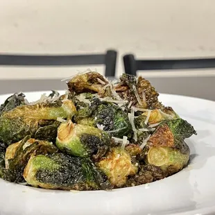 Truffle Parmesan Brussel Sprouts 14 fried brussels sprouts, truffle oil, shredded parmesan