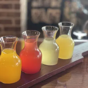 Mimosa flight! Mango, strawberry, pineapple, and orange!