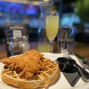 a plate of fried chicken and waffles