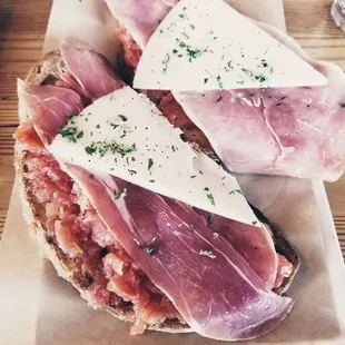 Catalonia tomato toast eith prosciutto ~$9