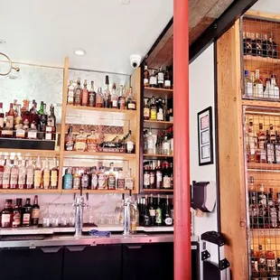 a bar full of liquor bottles