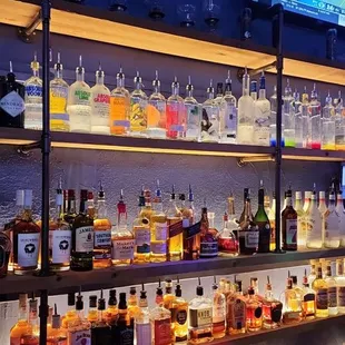 a variety of liquors on shelves
