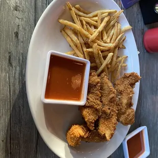 Tender Plate w buffalo sauce with fries.