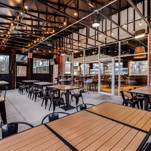 tables and chairs inside a restaurant