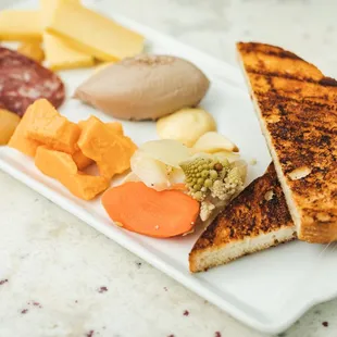 grilled cheese, meat, and vegetables