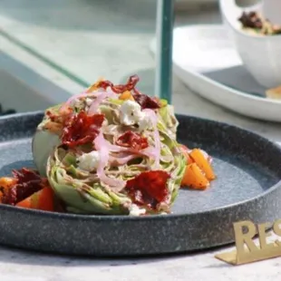 a plate of food with a reserved sign