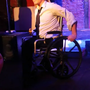 Jake Potter of Accessible Comedy hosting Talk Nerdy To Me: A Weekly Burlesque Revue at The Dragon&apos;s Den