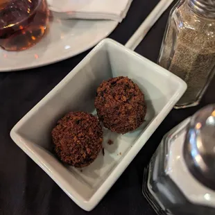 Fish and grits with crab balls on the side