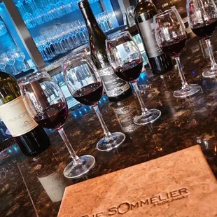 wine glasses and a menu