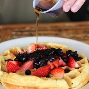 Belgian Waffle ($11.50) - served with fruit and syrup. It tastes good but like a normal waffle, not Belgian.