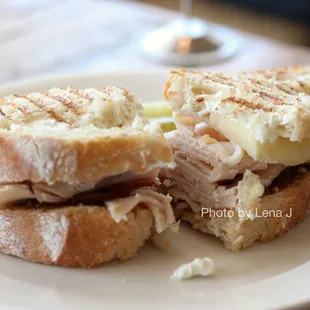 Pistachio Turkey Sandwich ($11.95) - pistachio crumbles, oven roasted turkey, goat cheese, fig preserves, apple slices on Italian bread