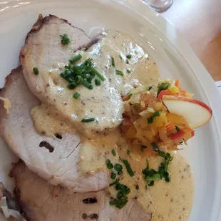 Stuffed pork,  brie sauce,  apple sauerkraut slaw.  The cherries and nuts in the stuffing added a wonderful depth of flavor.