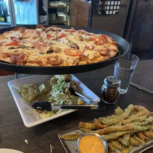 Sully pizza , Cesar salad, green bean fries