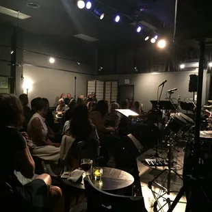 a group of people sitting in chairs