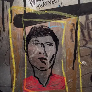 a drawing of a man in a picture frame