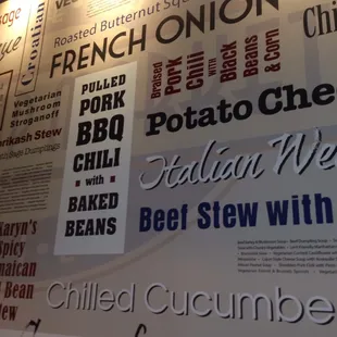 a variety of menus on the wall