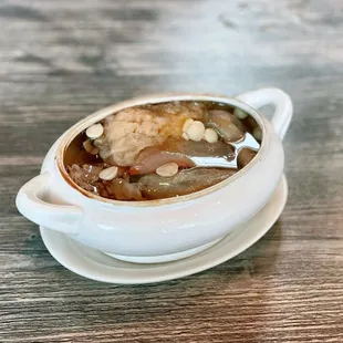 F6. Stewed Soup with Quail, Chuan Bei, Apricot Kernel, Snow Fungus. and Snow Pea.