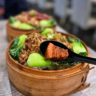 S5 梅菜红烧腩仔荷叶蒸饭 - Steamed Rice in Lotus Leaf w/ braised pork [belly], preserved veggies | $17.99