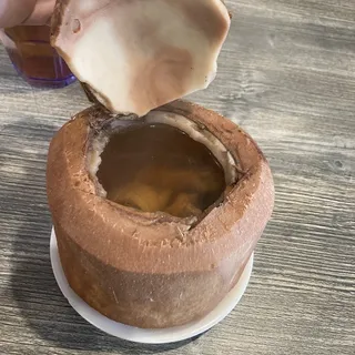 F8. Stewed Whole Coconut Soup with Chicken, Lemongrass, and Ginge