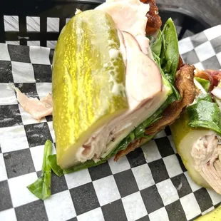 Pickle acting as the sandwich bread. YUMMY!