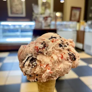 Cherry amaretto fudge on a sugar cone.