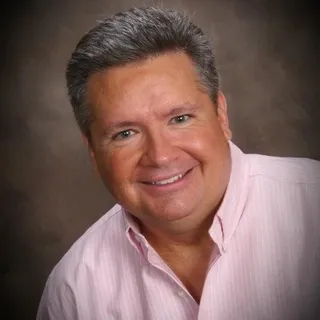 Scott E.