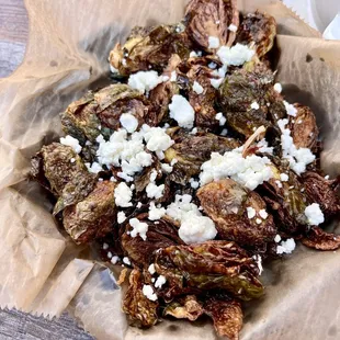 Brussels Sprouts - Yummy!!! Fried crispy, creamy goat cheese and a sweet &amp; spicy sauce. Definitely try these!