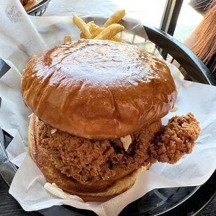 a fried chicken sandwich and french fries