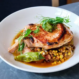 Berkshire Pork Chop with smoked bacon &amp; yellow corn succotash,
vidalia onions, honey mustard, marsala cream demi-glace