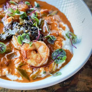 Shrimp &amp; Grits with creole tomato gravy, crème fraîche, shishito peppers