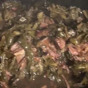 Fresh greens with smoked turkey and andouille sausage