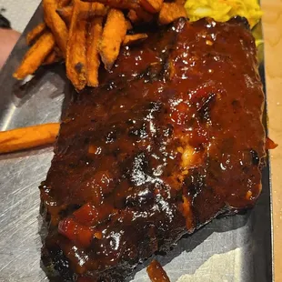 Ribs,  sweet potato fries, slaw. Nothing left but the bones after dinner!