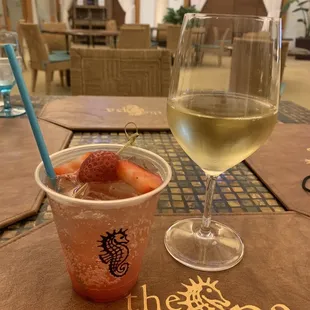 A mock-tail strawberry drink and a nice glass of Chardonnay