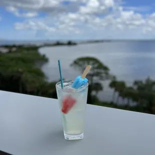 a drink with a straw in it