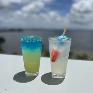 two cocktails on a table