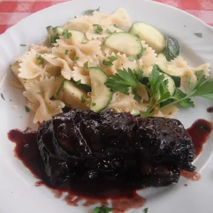 Braised short ribs in red wine reduction sauce