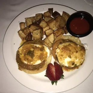 Rancho Benedict $14. Spicy homemade red salsa and breakfast potatoes.