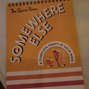 a notepad with a picture of some drinks