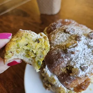 a half eaten donut on a plate