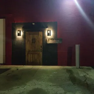 the entrance to a bar