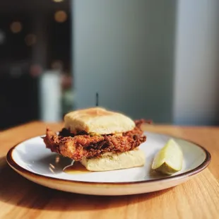 a fried chicken sandwich on a biscuit