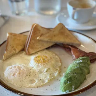 Eggs, avocado, bacon, and toast