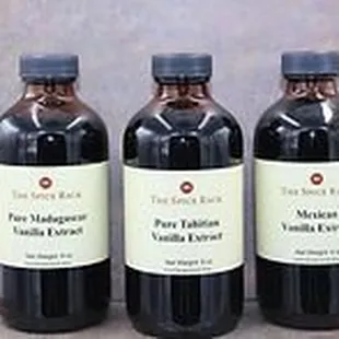 three bottles of vanilla syrup
