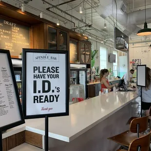 a sign that reads please have your id ready